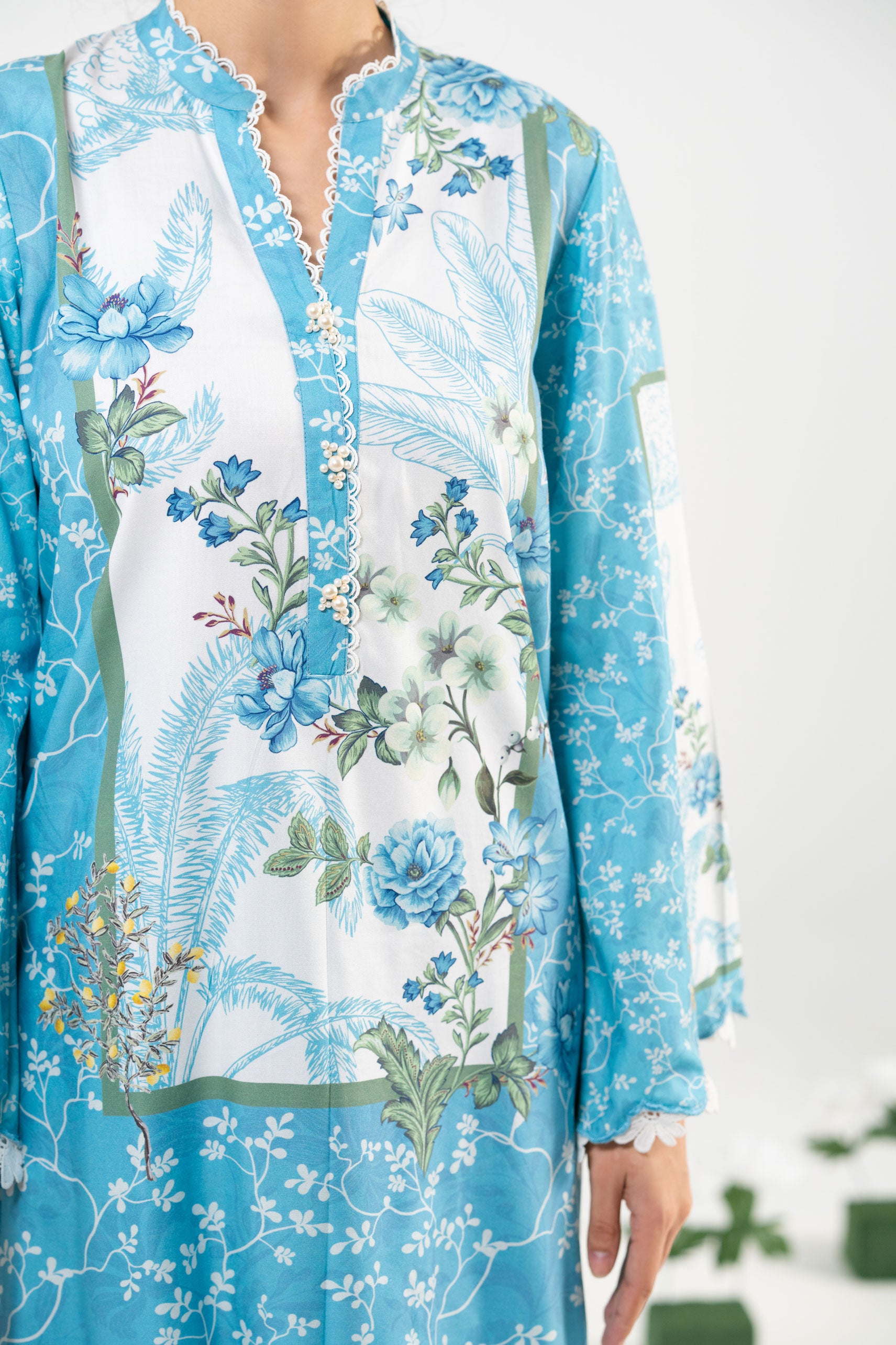 Blue floral dress with a white background